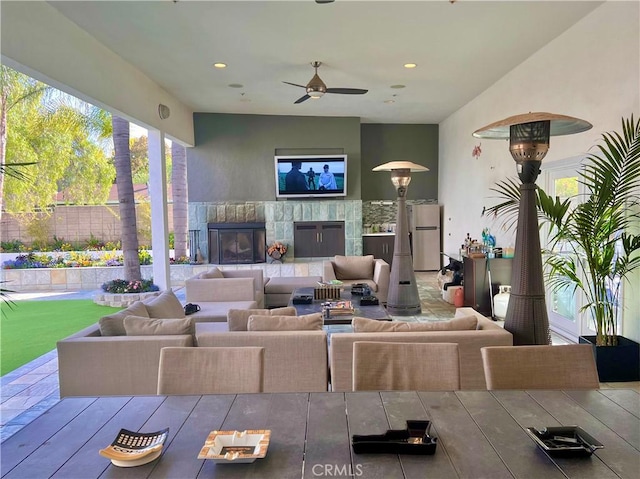 20301 SW Cypress St, Newport Beach, CA 92660 - view of patio with an outdoor living space with a fireplace, fence, and ceiling fan
