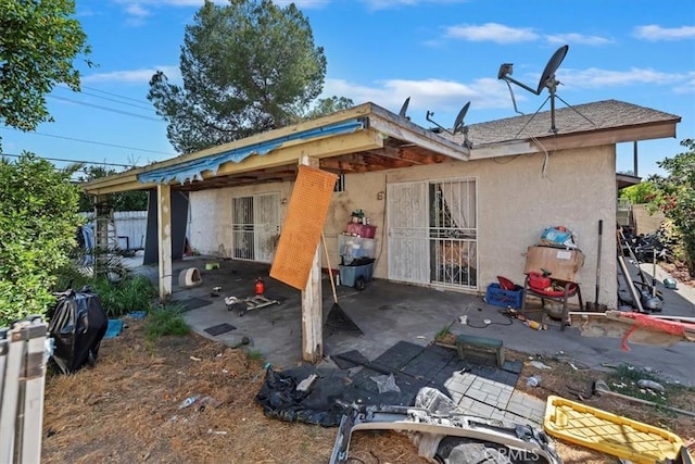 435 Leverett Ave, La Puente, CA 91744 - rear view of property with stucco siding and a patio area