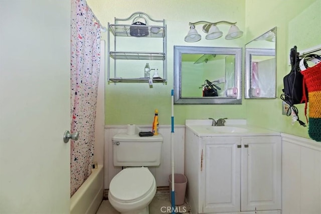 435 Leverett Ave, La Puente, CA 91744 - bathroom featuring wainscoting, vanity, and shower / bath combo with shower curtain