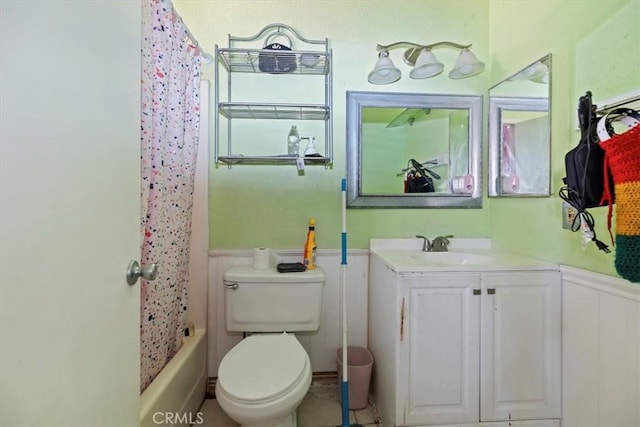 435 Leverett Ave, La Puente, CA 91744 - bathroom with a wainscoted wall, vanity, and shower / tub combo with curtain