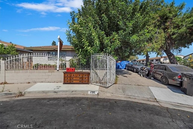 435 Leverett Ave, La Puente, CA 91744 - view of front of home with stucco siding and a gate