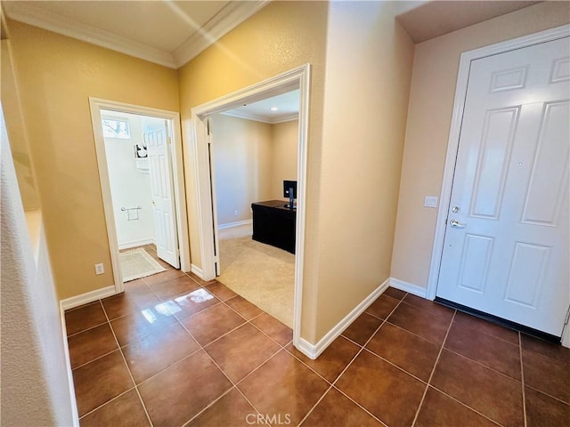 40973 Cebu Dr, Temecula, CA 92591 - entrance foyer with ornamental molding, dark tile patterned floors, and baseboards