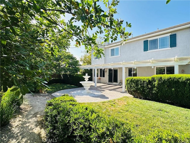 40973 Cebu Dr, Temecula, CA 92591 - back of property with a pergola, a patio area, stucco siding, and a lawn