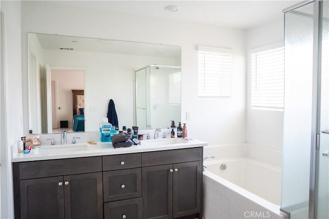 15148 Ridge Ln Unit 4, Fontana, CA 92336 - ensuite bathroom featuring a stall shower, double vanity, and a bath