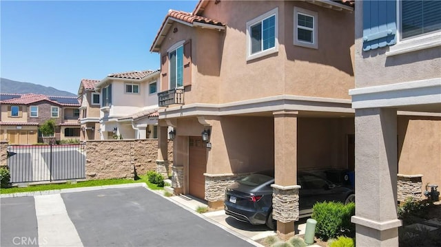 15148 Ridge Ln Unit 4, Fontana, CA 92336 - exterior space with a residential view, fence, and a mountain view