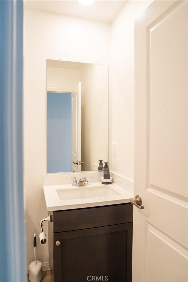 15148 Ridge Ln Unit 4, Fontana, CA 92336 - bathroom with vanity and baseboards