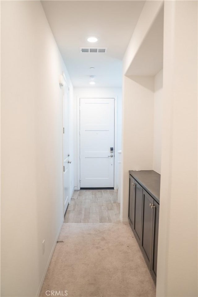 15148 Ridge Ln Unit 4, Fontana, CA 92336 - hallway with light carpet, recessed lighting, and baseboards