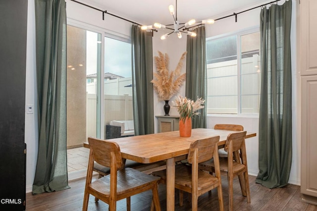 345 Allen Dr, Santa Paula, CA 93060 - dining room featuring a chandelier, wood finished floors, and baseboards