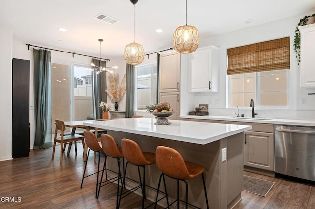 345 Allen Dr, Santa Paula, CA 93060 - kitchen with stainless steel dishwasher, a sink, a kitchen island, a chandelier, and light countertops