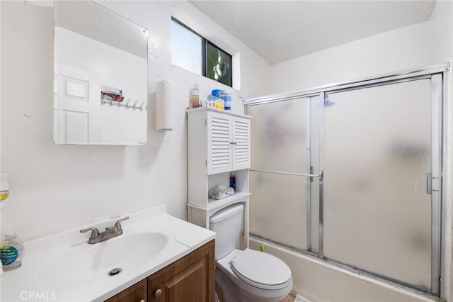 1165 E 24th St, Los Angeles, CA 90011 - bathroom featuring vanity, shower / bath combination with glass door, and toilet