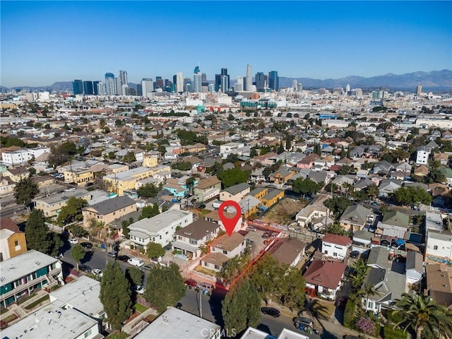 1165 E 24th St, Los Angeles, CA 90011 - view of property location with a view of skyline and mountains
