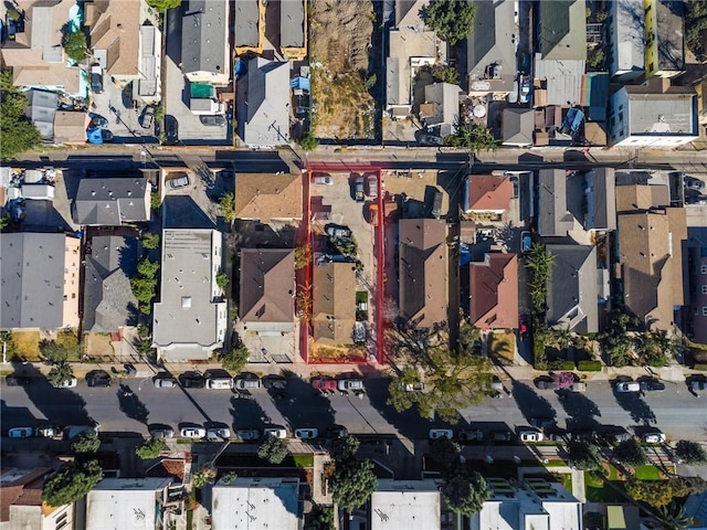 1165 E 24th St, Los Angeles, CA 90011 - aerial perspective of suburban area featuring property parcel outlined