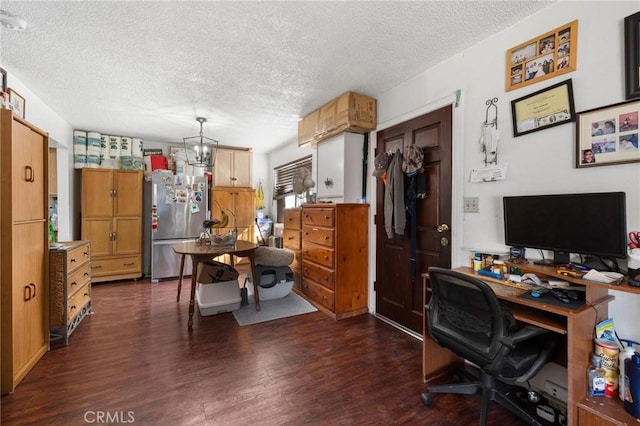 1165 E 24th St, Los Angeles, CA 90011 - home office with a textured ceiling, dark wood-style flooring, and a chandelier