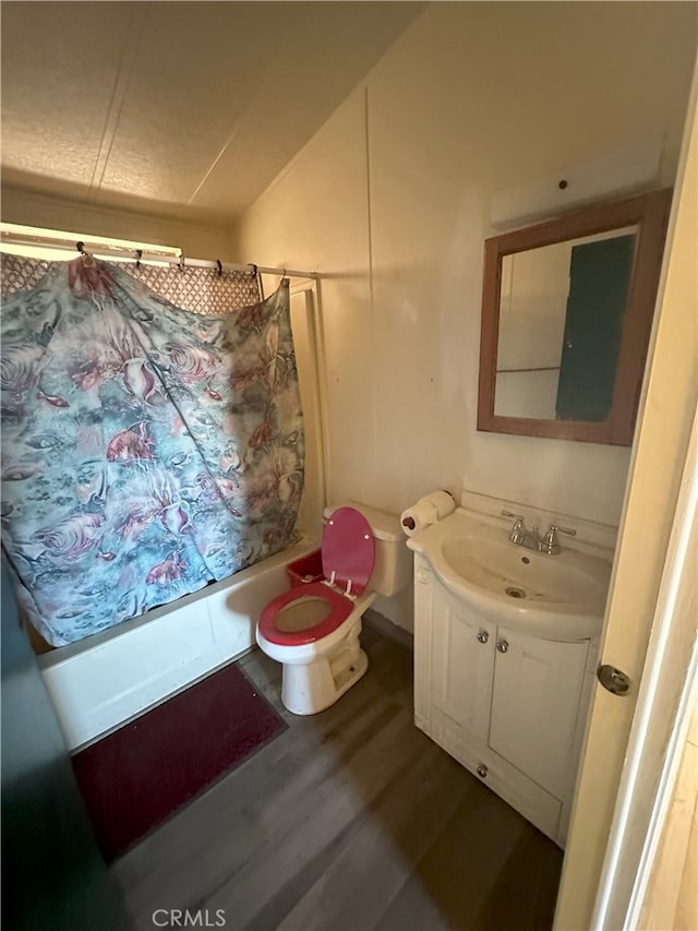 7677 Bedouin Ave Unit 29, Palms, CA 92277 - full bath featuring vanity, shower / bathtub combination with curtain, and wood finished floors