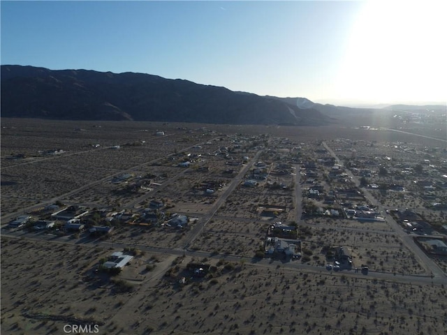 7677 Bedouin Ave Unit 29, Palms, CA 92277 - aerial view of property's location featuring a mountain backdrop