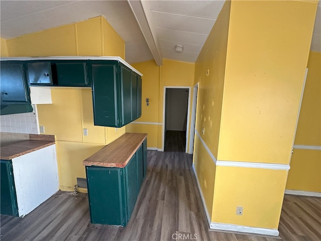7677 Bedouin Ave Unit 29, Palms, CA 92277 - kitchen with dark wood-style floors and green cabinets