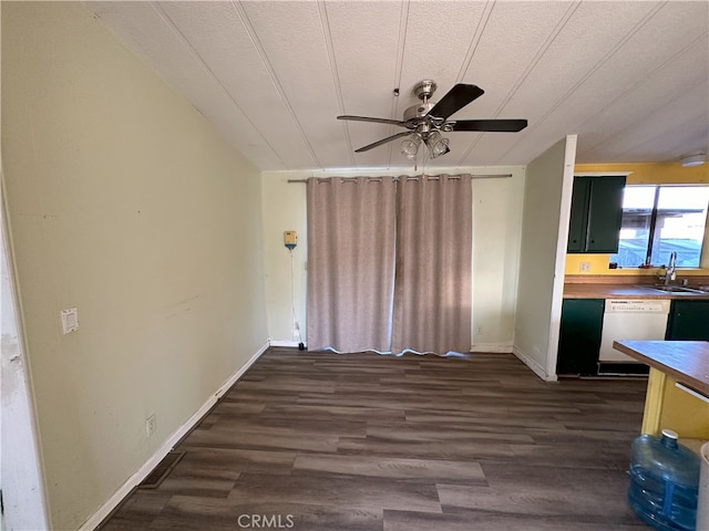 7677 Bedouin Ave Unit 29, Palms, CA 92277 - unfurnished living room with a ceiling fan and dark wood-style flooring