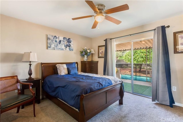 28001 Winged Foot Dr, Menifee, CA 92586 - carpeted bedroom featuring access to exterior, a ceiling fan, and baseboards