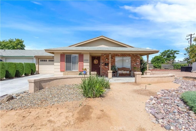 28001 Winged Foot Dr, Menifee, CA 92586 - view of front of home with a porch, an attached garage, and driveway