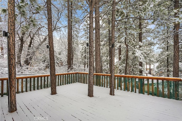 view of snow covered deck