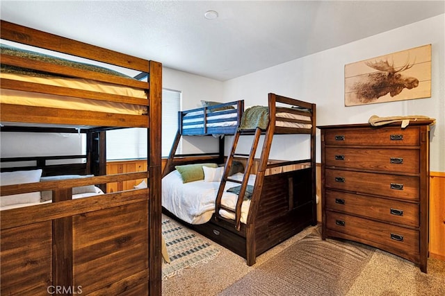 bedroom with light carpet