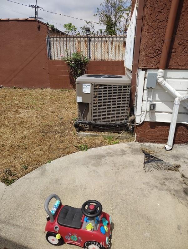 1022 W 101st St, Los Angeles, CA 90044 - exterior view of a central AC unit