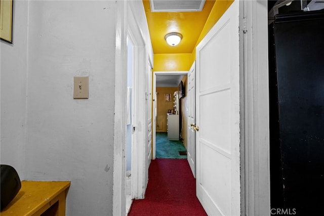 1022 W 101st St, Los Angeles, CA 90044 - corridor featuring dark colored carpet