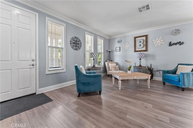3039 Cayenne Way, Perris, CA 92571 - living area featuring ornamental molding, wood finished floors, and baseboards