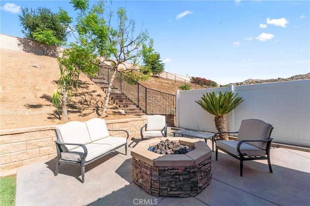 3039 Cayenne Way, Perris, CA 92571 - fenced backyard featuring a patio, stairs, and an outdoor living space with a fire pit