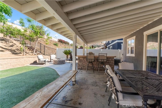 3039 Cayenne Way, Perris, CA 92571 - fenced backyard featuring an outdoor fire pit, a patio area, and central air condition unit