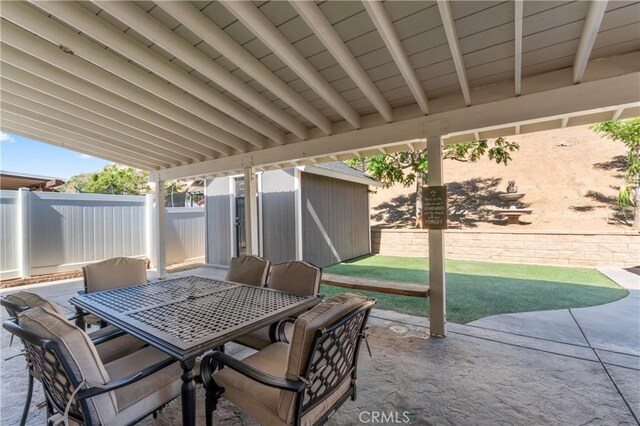 3039 Cayenne Way, Perris, CA 92571 - fenced backyard featuring a patio and outdoor dining space