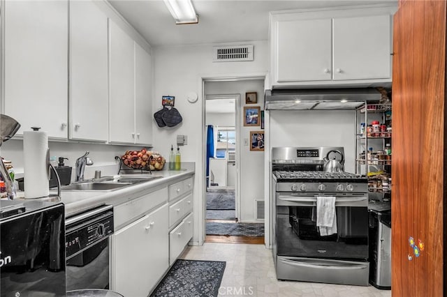 8748 Sylmar Ave, Panorama City, CA 91402 - kitchen featuring stainless steel gas range oven, a sink, dishwasher, premium range hood, and white cabinetry