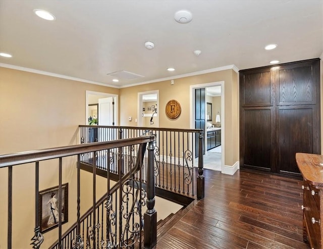 26780 Camino Seco, Temecula, CA 92590 - corridor with an upstairs landing, dark wood-style floors, recessed lighting, crown molding, and baseboards