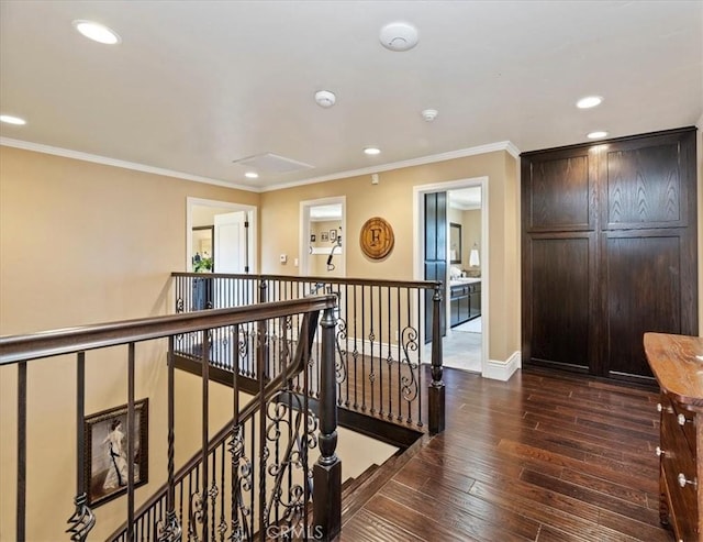 26780 Camino Seco, Temecula, CA 92590 - hallway featuring an upstairs landing, dark wood-type flooring, recessed lighting, and ornamental molding