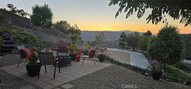 26780 Camino Seco, Temecula, CA 92590 - patio terrace at dusk with a patio and a mountain view
