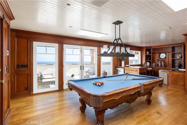 24352 Santa Clara Ave, Dana Point, CA 92629 - playroom featuring light wood-style floors, pool table, wood ceiling, and french doors