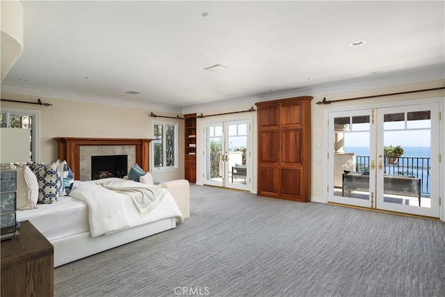 24352 Santa Clara Ave, Dana Point, CA 92629 - bedroom with access to exterior, light colored carpet, french doors, a fireplace, and ornamental molding