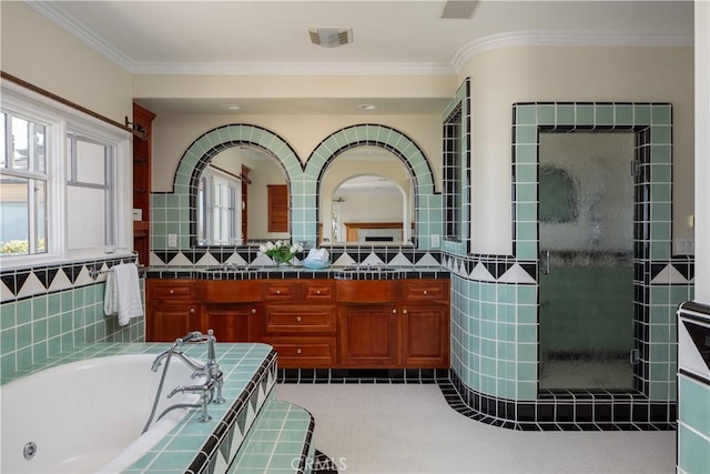 24352 Santa Clara Ave, Dana Point, CA 92629 - bathroom with double vanity, a jetted tub, crown molding, a shower stall, and tile walls