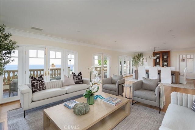 24352 Santa Clara Ave, Dana Point, CA 92629 - living area with light wood-style flooring and ornamental molding