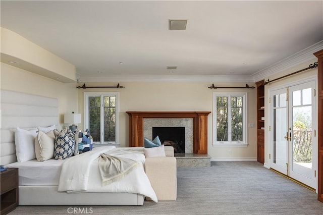 24352 Santa Clara Ave, Dana Point, CA 92629 - carpeted bedroom with access to outside, multiple windows, a premium fireplace, and crown molding