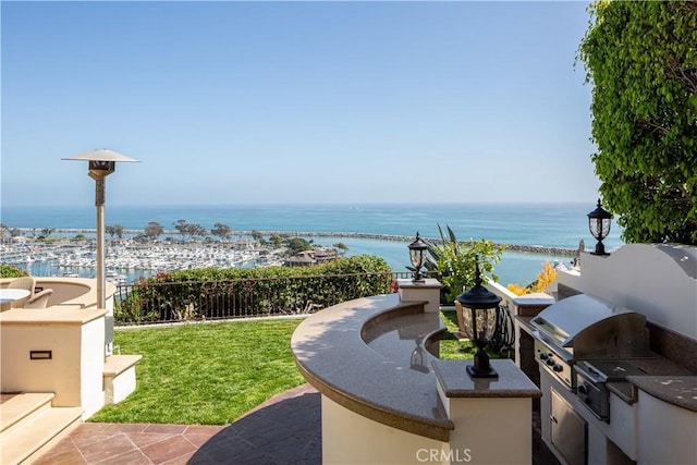 24352 Santa Clara Ave, Dana Point, CA 92629 - view of patio / terrace with a water view and exterior kitchen