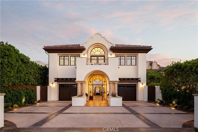 24352 Santa Clara Ave, Dana Point, CA 92629 - mediterranean / spanish house featuring a balcony, driveway, and a garage