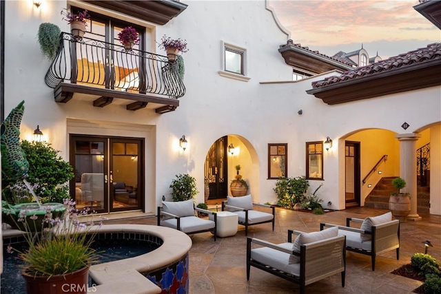 24352 Santa Clara Ave, Dana Point, CA 92629 - patio terrace at dusk featuring a balcony, a patio, and outdoor lounge area