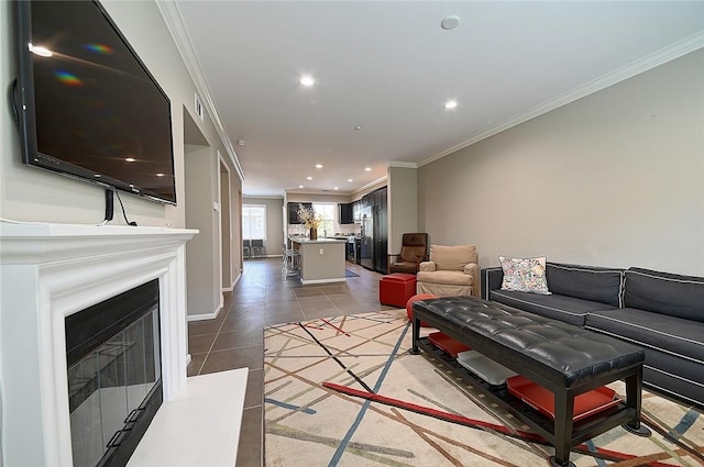 2303 Jefferson St Unit 1215, Torrance, CA 90501 - living room with crown molding, tile patterned flooring, recessed lighting, a glass covered fireplace, and baseboards
