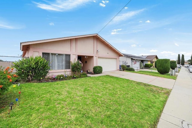 view of front facade featuring an attached garage and concrete driveway