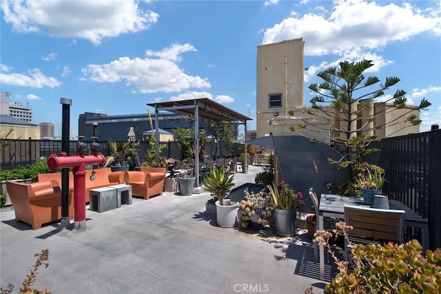 108 W 2nd St Unit 610, Los Angeles, CA 90012 - view of patio featuring outdoor dining space and an outdoor hangout area