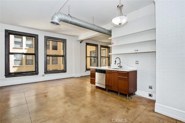 108 W 2nd St Unit 610, Los Angeles, CA 90012 - bar featuring dishwasher, a sink, light tile patterned floors, and pendant lighting