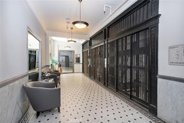108 W 2nd St Unit 610, Los Angeles, CA 90012 - hall featuring a wainscoted wall