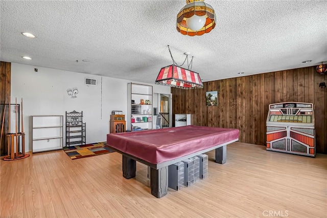 9522 Yellowstone Dr, Huntington Beach, CA 92646 - rec room with a textured ceiling, pool table, wood finished floors, wooden walls, and recessed lighting
