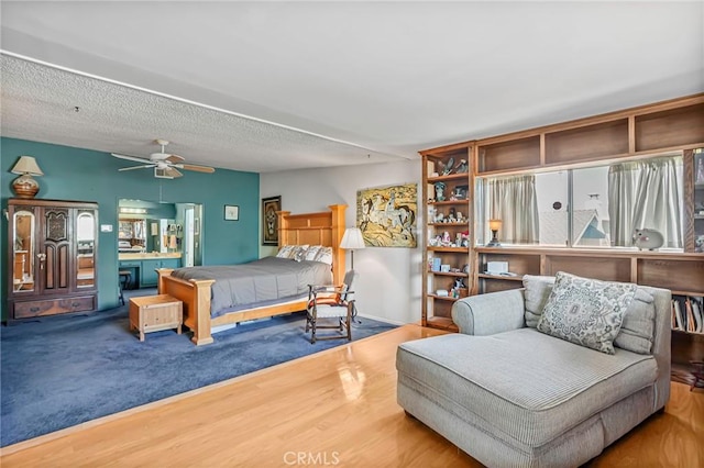9522 Yellowstone Dr, Huntington Beach, CA 92646 - bedroom with multiple windows, wood finished floors, and a ceiling fan